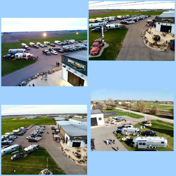 Aerial views of Rush Creek Distilling with Airstreams and cars in the parking lot.